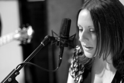 Sarah Gromko leading her band in 2006.